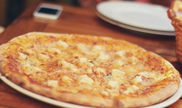 Cheese pizza with pepperoni