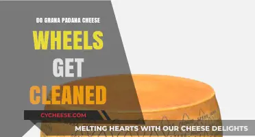 The Art of Cleaning Grana Padano Cheese Wheels