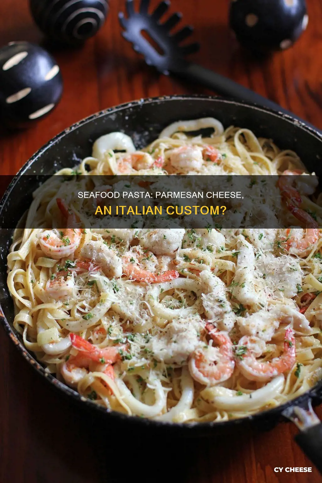 do italians serve seafood pasta with grated parmesan cheese