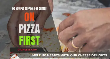 The Great Pizza Debate: Toppings or Cheese First?