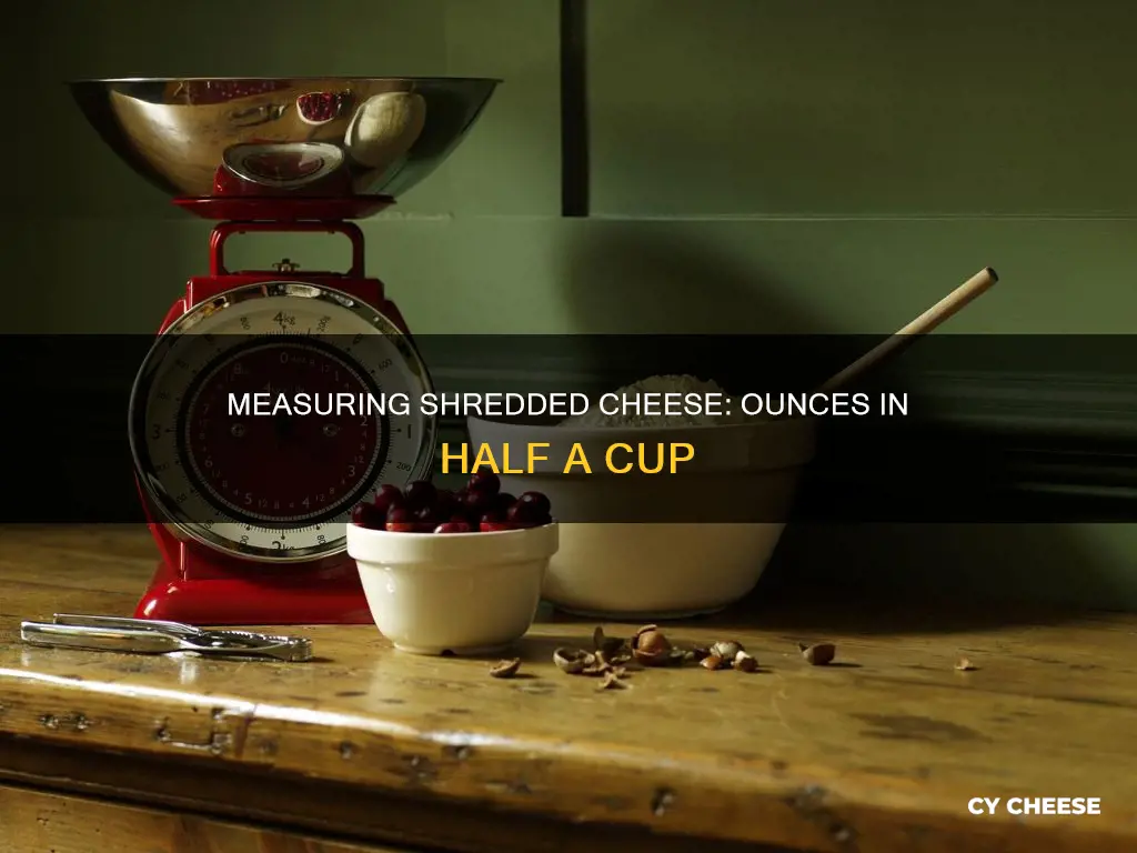 how man ounces is half a cup of shredded cheese