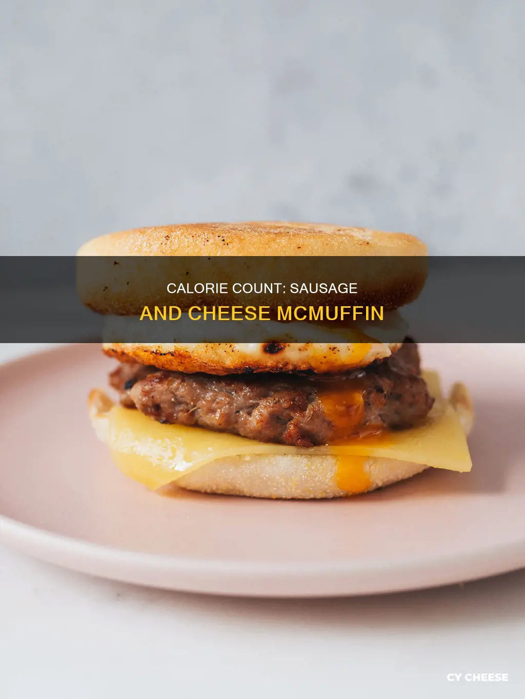 how many calories are in a sausage and cheese mcmuffin