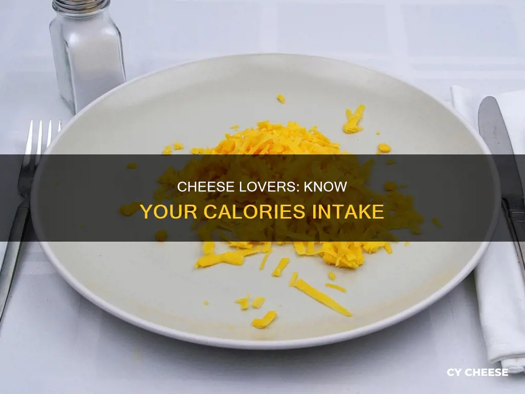 how many calories in 1 2 cup of shredded cheese