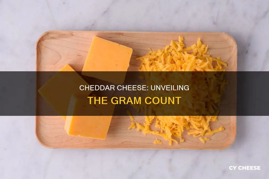 how many grams dose cheddar cheese have