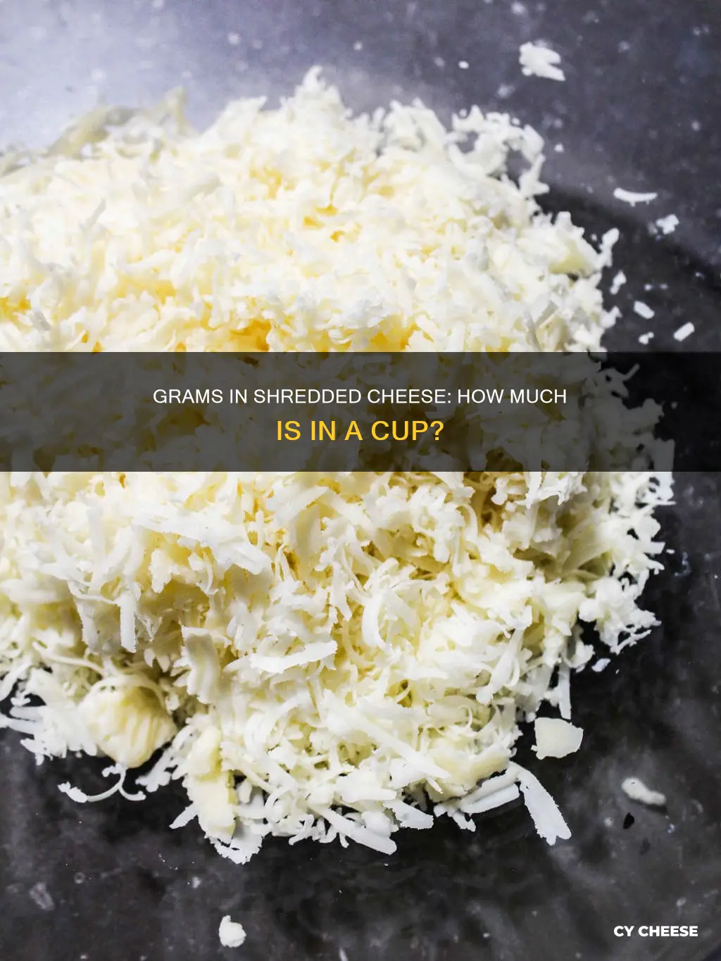 how many grams in 1 2 cup shredded cheese