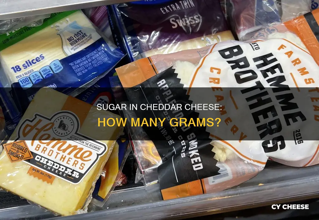 how many grams of sugar in cheddar cheese