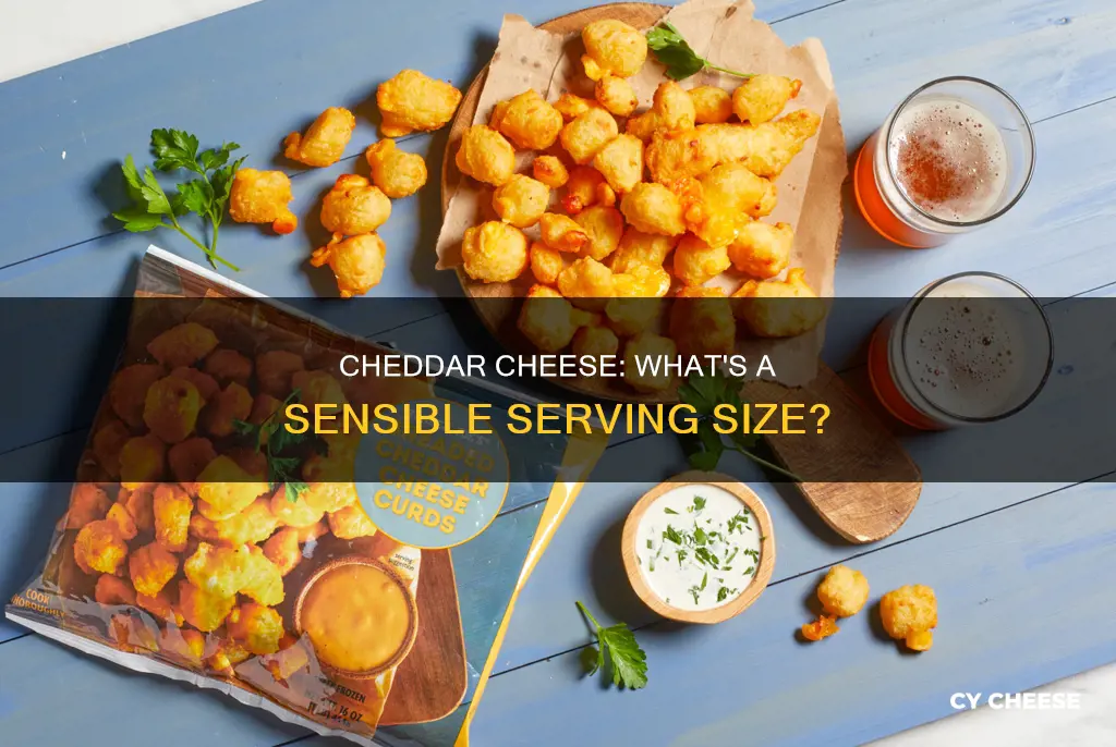 how many ounces of cheddar cheese is a serving