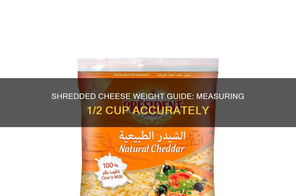 how much does 1 2 cup of shredded cheese weigh