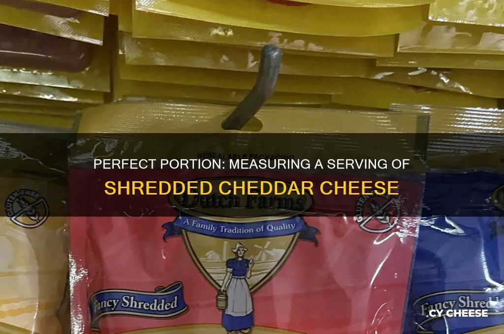 how much is a serving of shredded cheddar cheese