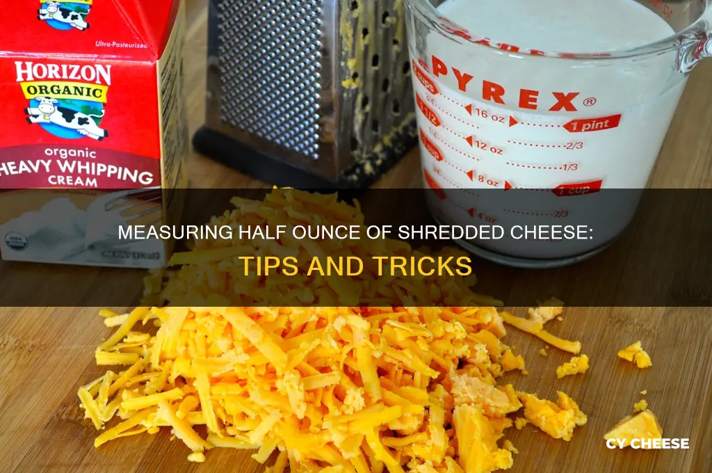 how much is half ounces of shreeded cheese