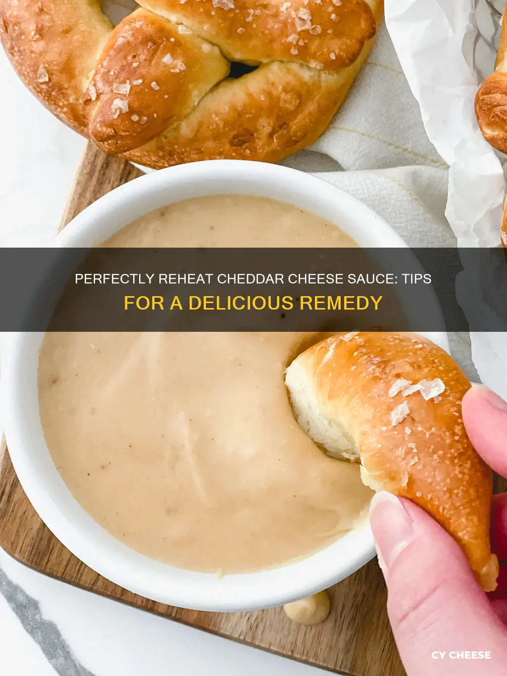 how to reheat cheddar cheese sauce