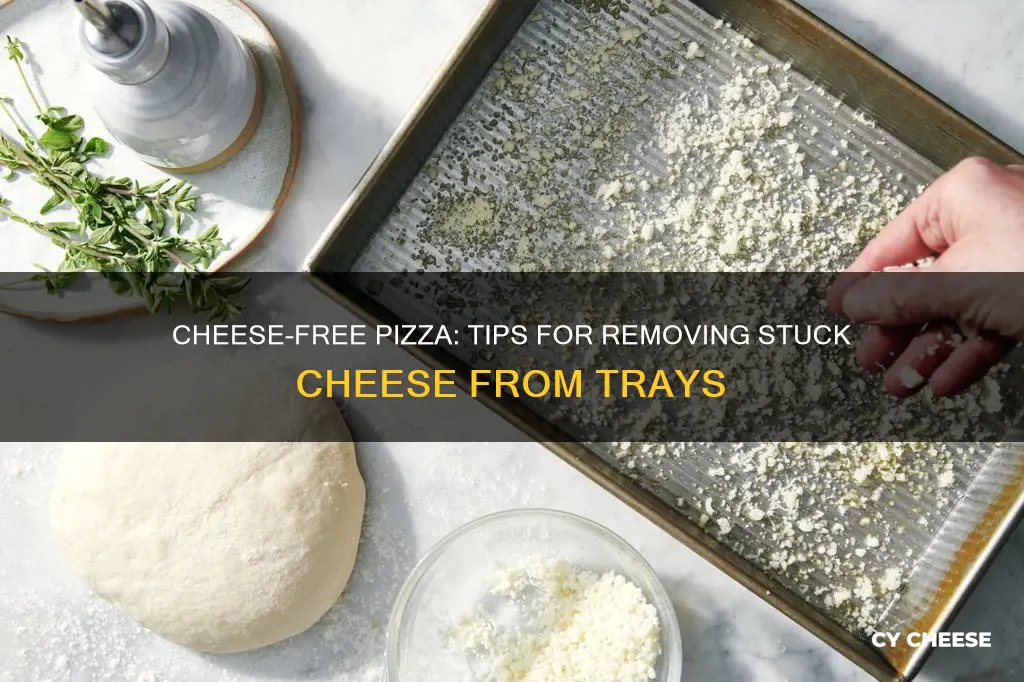 how to remove stuck cheese from a pizza tray