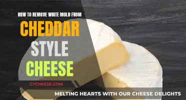 Removing White Mold from Cheddar-Style Cheese