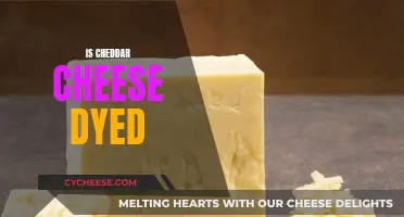 Unveiling the Colorful Truth: Is Cheddar Cheese Dyed?