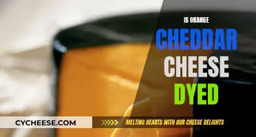 Unveiling the Secret: Is Orange Cheddar Cheese Dyed?