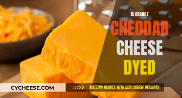 The Truth About Orange Cheddar Cheese's Color