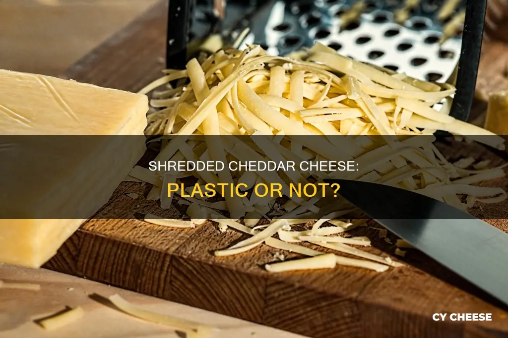 is there really plastic in pre-packaged shredded cheddar cheese