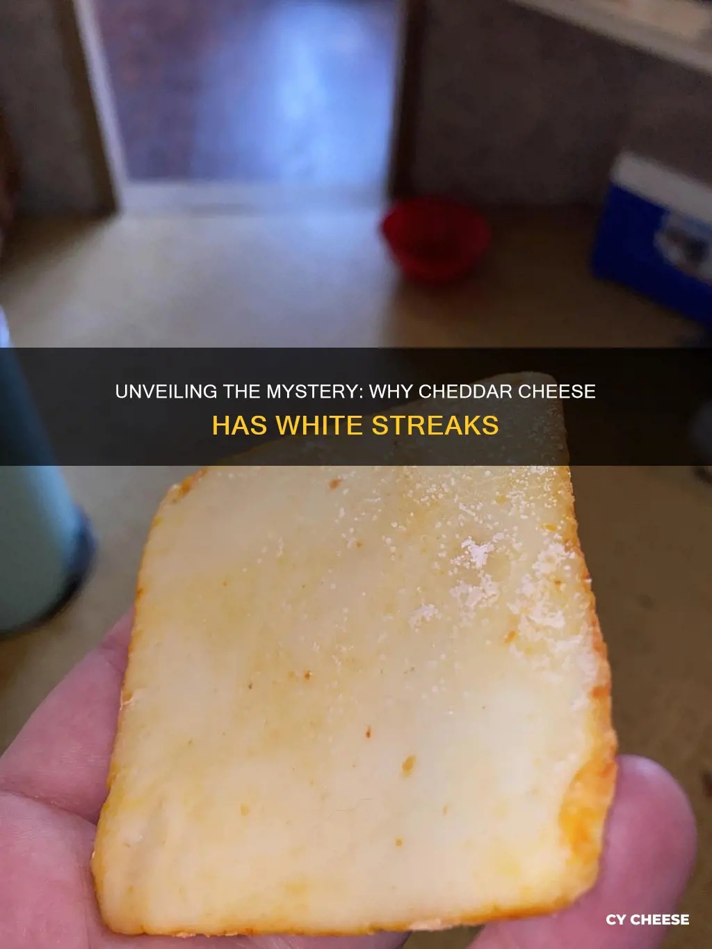 what are the white streaks on my cheddar cheese