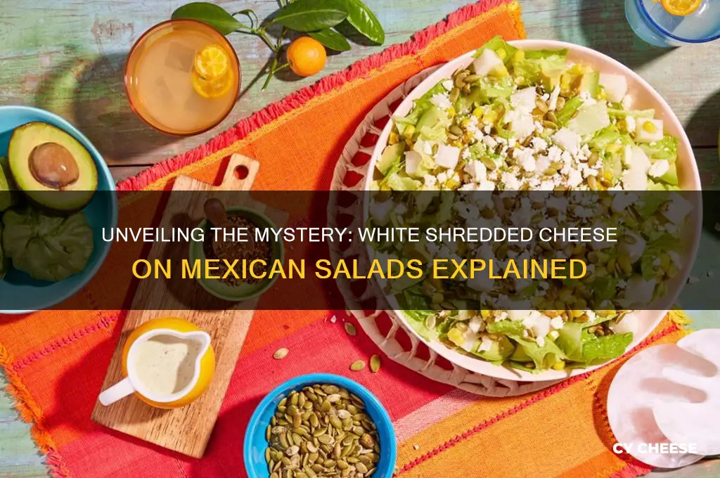 what is the white shredded cheese on mexican salads