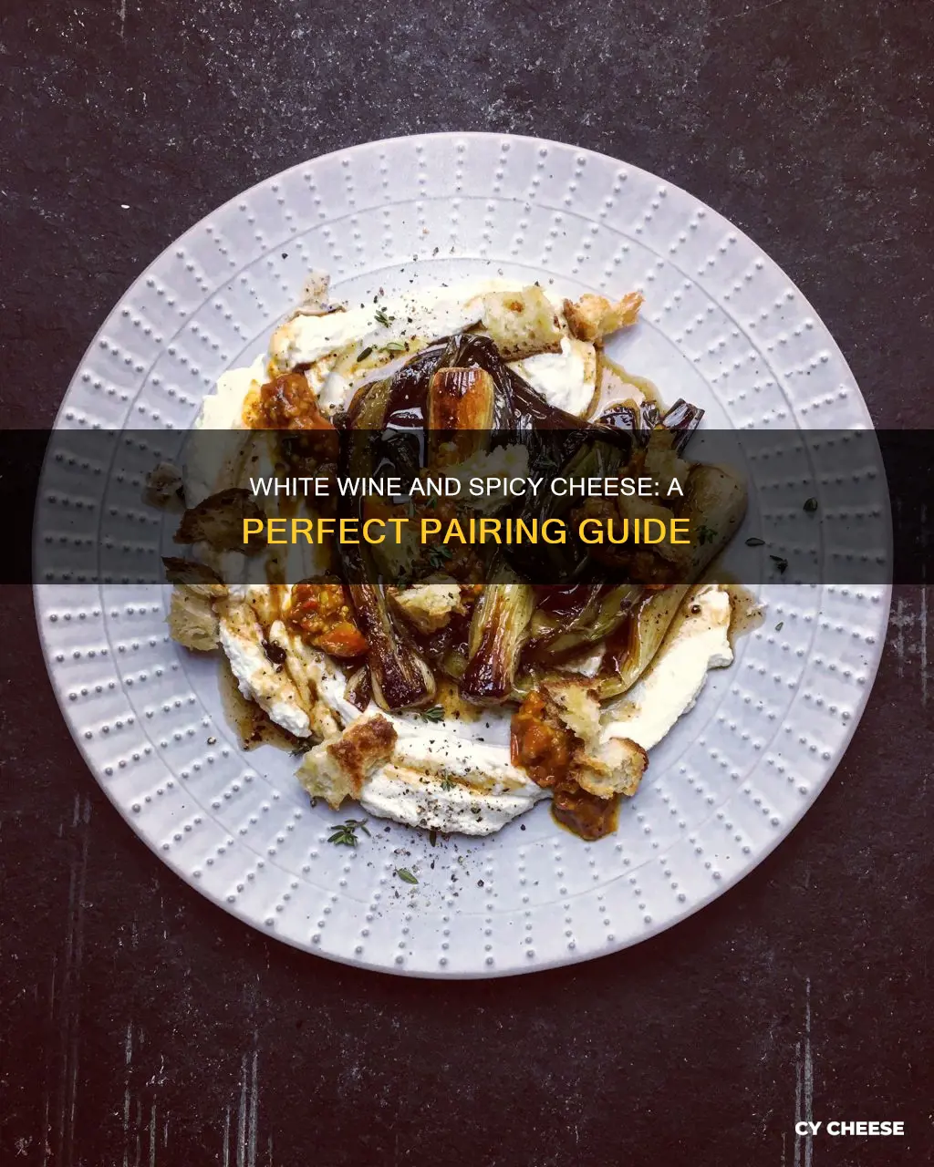 what kind of white wine with spicy cheese