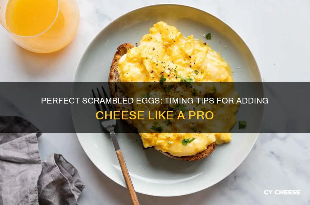 when do i add cheese to scrambled eggs