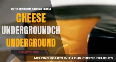 Unveiling the Secret: Why Wisconsin Cheddar's Orange Hue is Underground